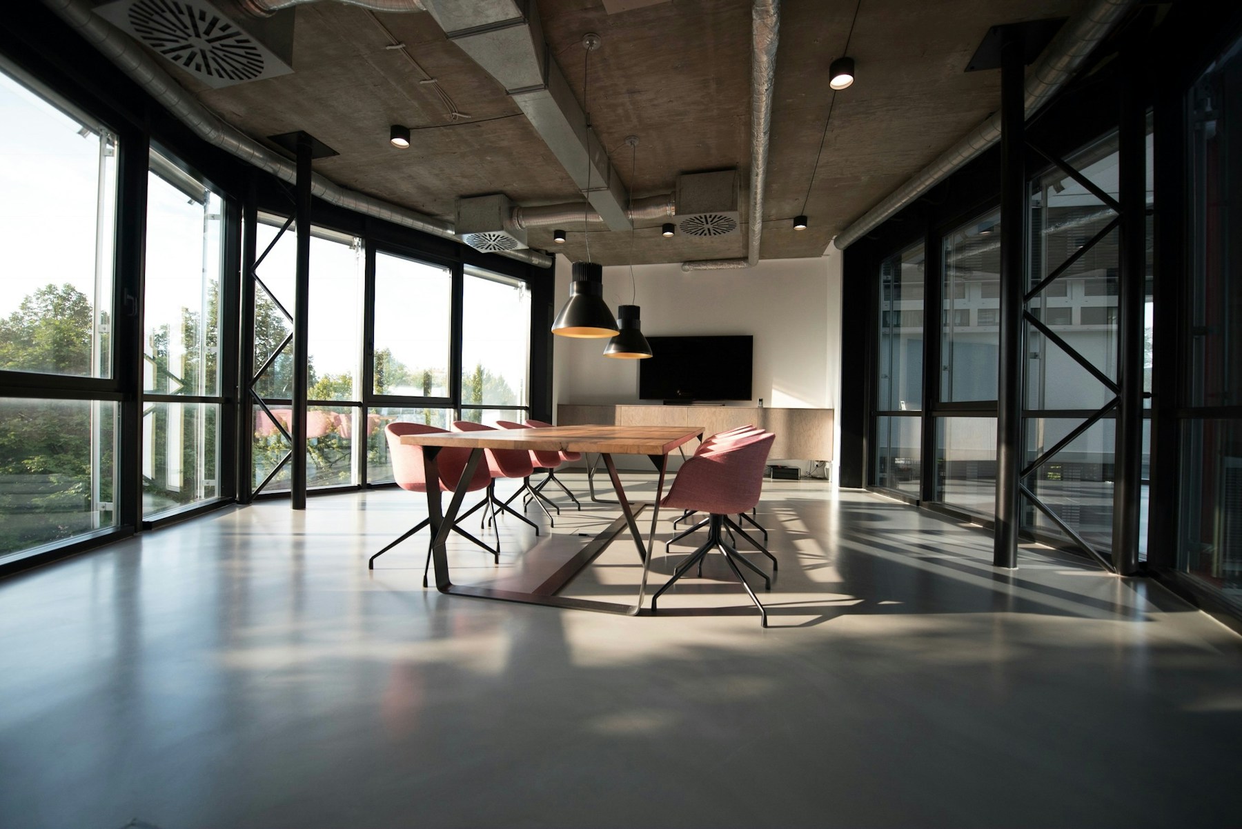 Warm sunlight across a working studio